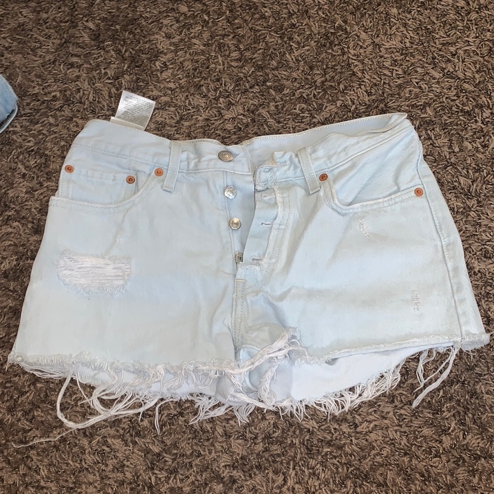 Levi’s light wash distressed denim shorts
